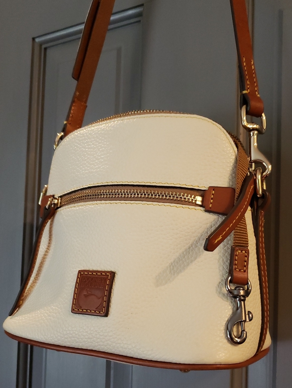 Dooney & Bourke White Pebbled Leather Crossbody with Tan Trim and Gold Hardware